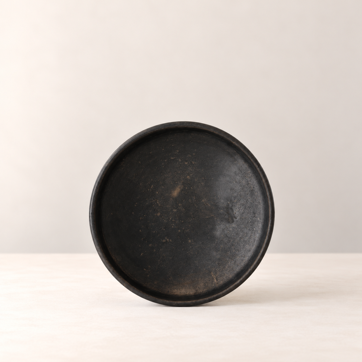 Low handmade black clay bowl by Rufina Ruiz López, interior view
