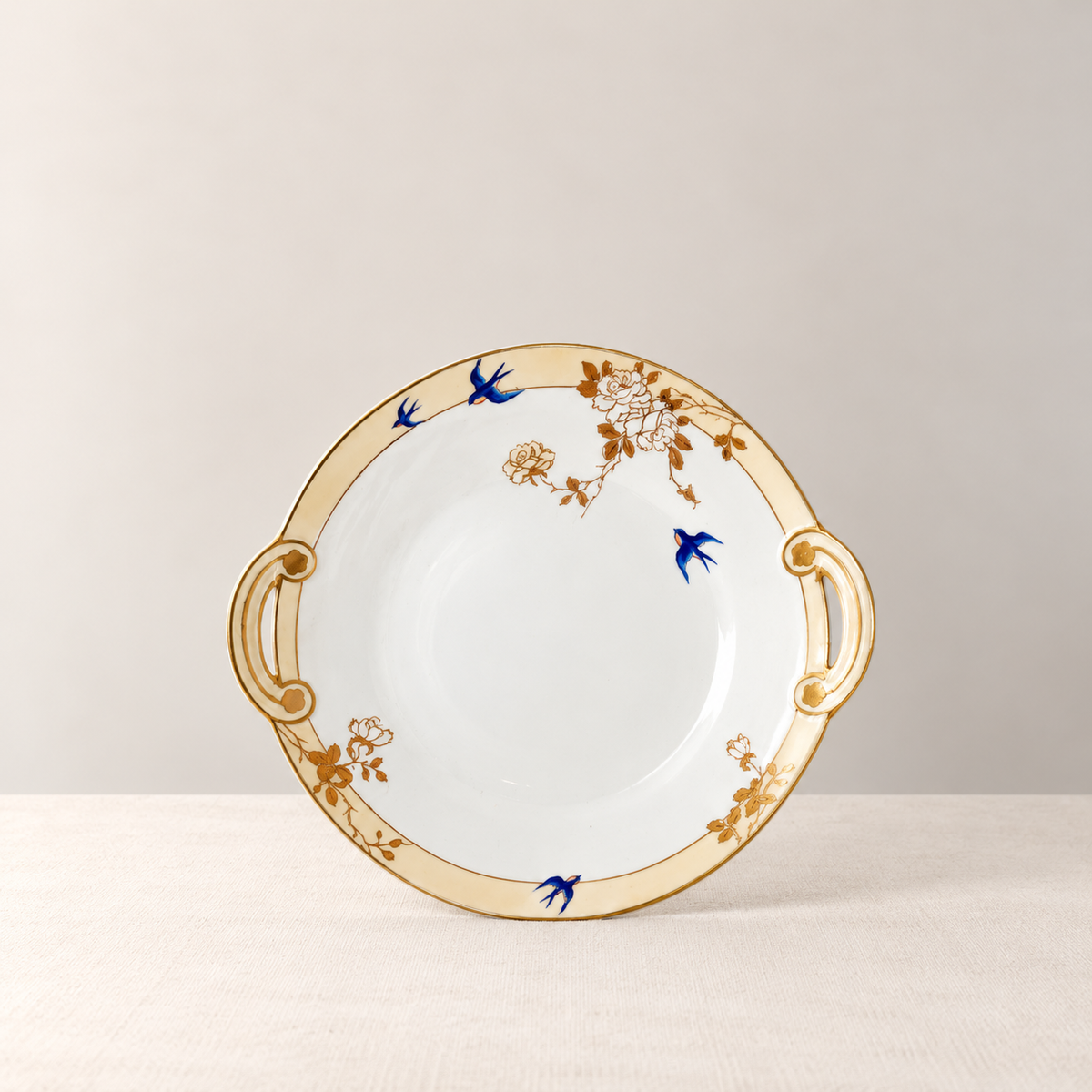Antique Nippon handled serving plate with bluebirds and gold floral decoration