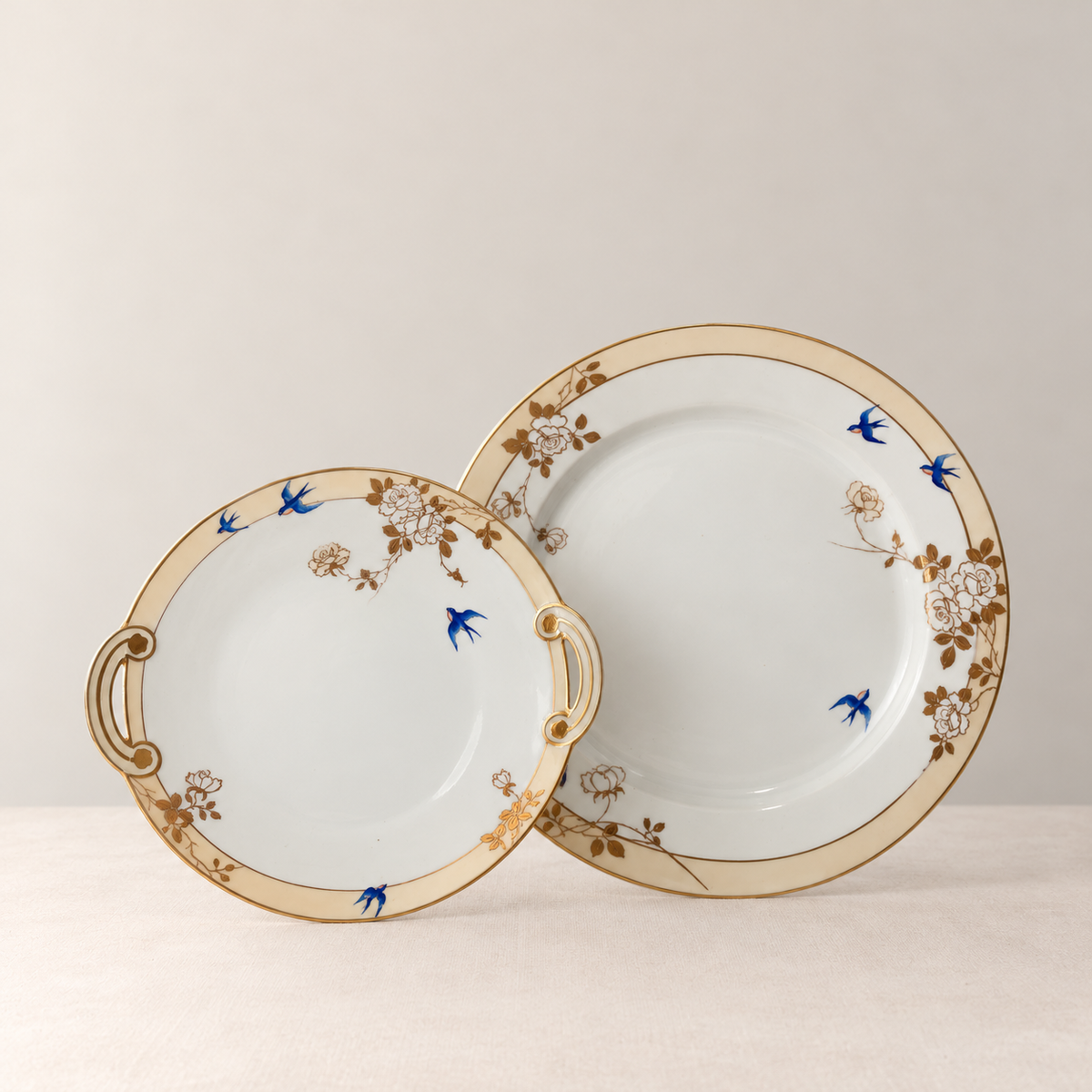 Handled serving plate shown with matching bluebird plate, sold separately