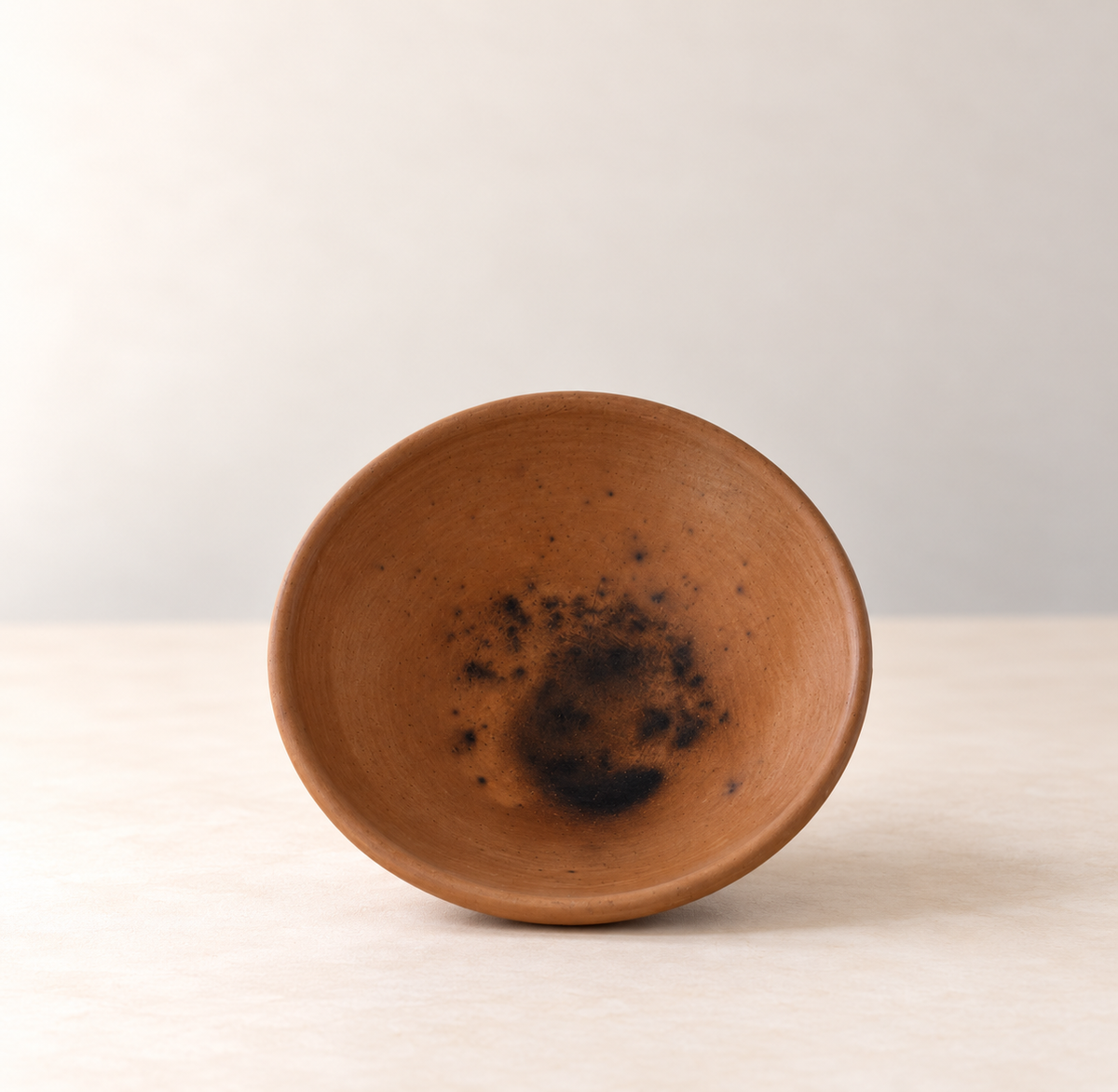 Interior view of handmade terracotta bowl